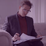 880 (7) 6 - Venture Forge Image of Head of ECommerce reviewing documents