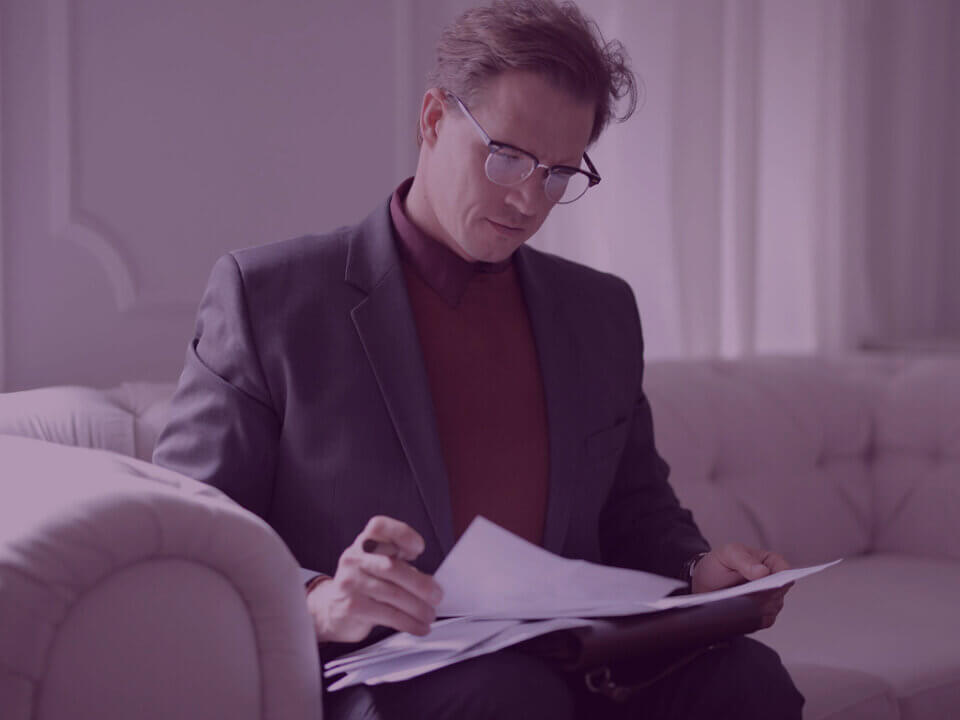 880 (7) 6 - Venture Forge Image of Head of ECommerce reviewing documents