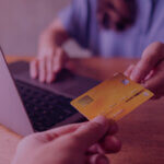 How is Black Friday’s late arrival redefining Q4 Sales Strategies on Amazon? - Venture Forge A person using a credit card for shopping online.