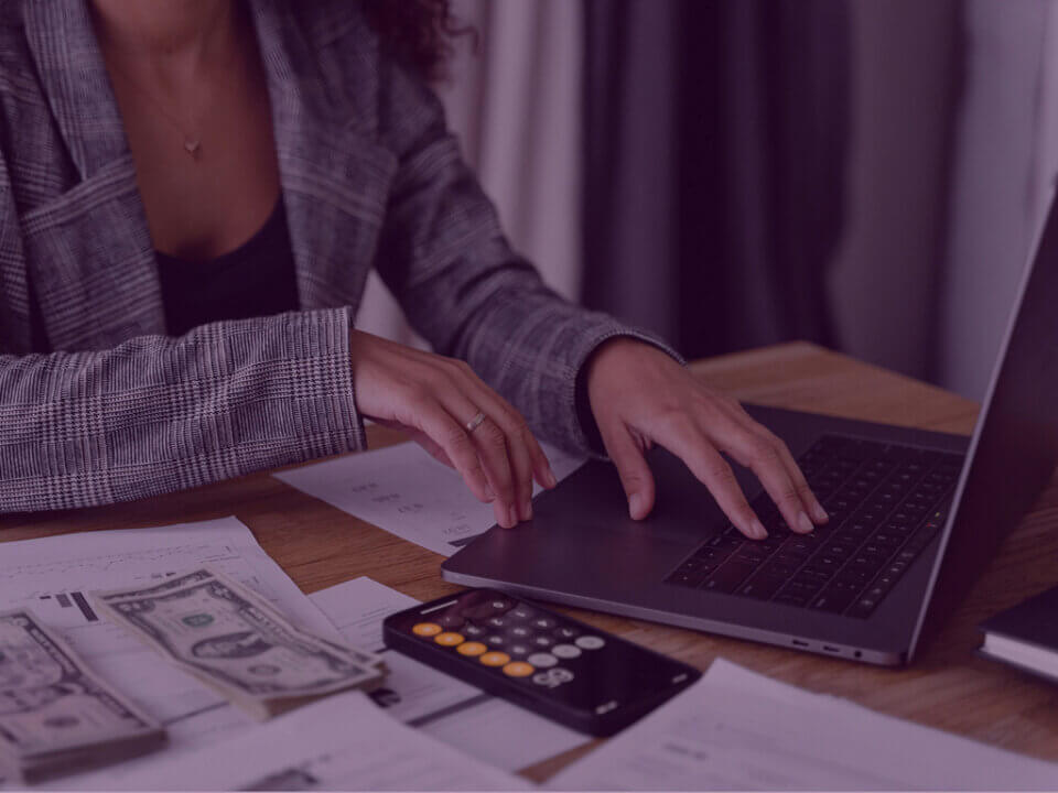 Women reviewing her Amazon Chargebacks