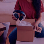 Snippet 3 - Venture Forge Women opening box with headphones in