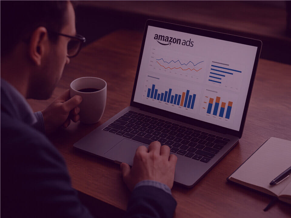 Are vCPM bids hurting your long-term Amazon growth? - Venture Forge Man reviewing Amazon Ads dashboard