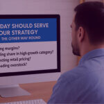 Image of man reading an amazon prime day strategy presentation