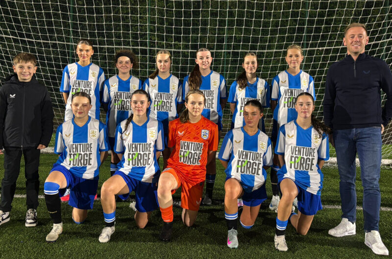Image of Huddersfield Town Women U23s with Andrew and Jack Banks