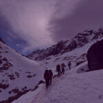 The Light Fund Charity Mountain Challenge - Venture Forge Fundraisers hiking through snowy mountain landscape in support of The Light Fund charity challenge