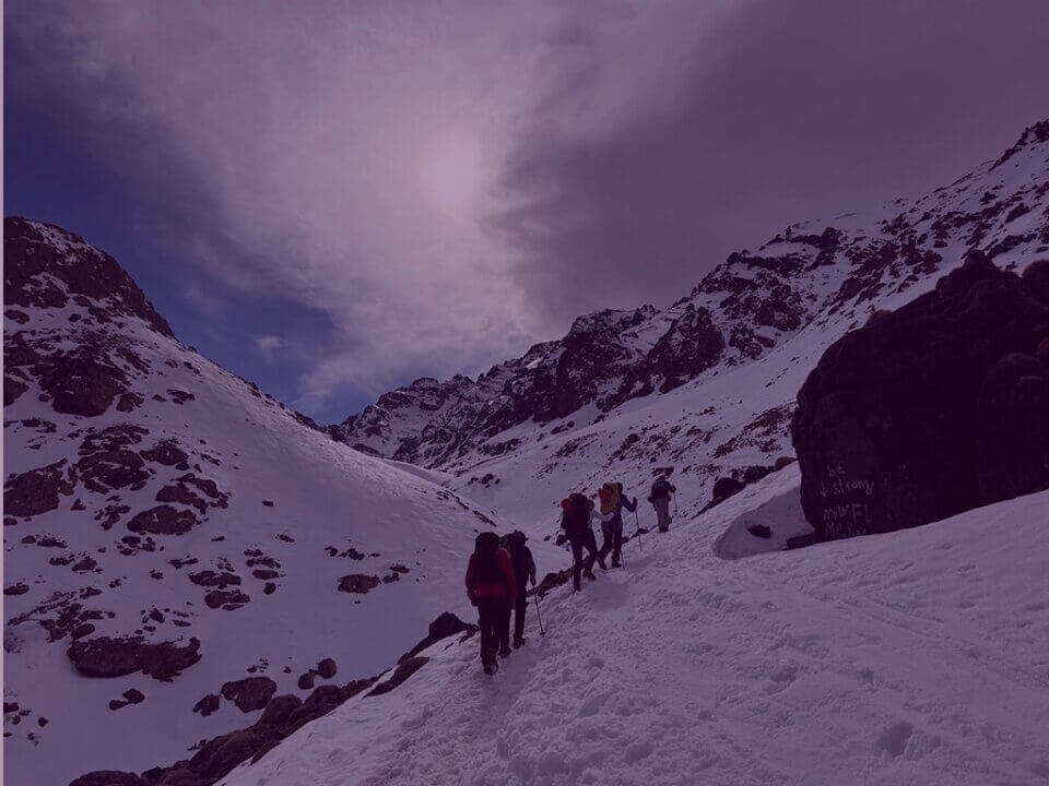 The Light Fund Charity Mountain Challenge - Venture Forge Fundraisers hiking through snowy mountain landscape in support of The Light Fund charity challenge