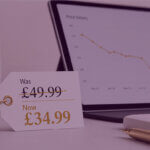 Retail price tag showing a crossed-out Was price and lower Now price beside a price history graph.