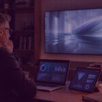 Amazon DSP and LinkedIn CTV for B2B Advertising - Venture Forge Senior media strategist reviewing Amazon DSP and LinkedIn CTV campaign performance on a connected TV dashboard
