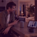 Alexa for Shopping and AI Product Discovery - Venture Forge Person using an AI shopping assistant and product discovery interface in a modern home