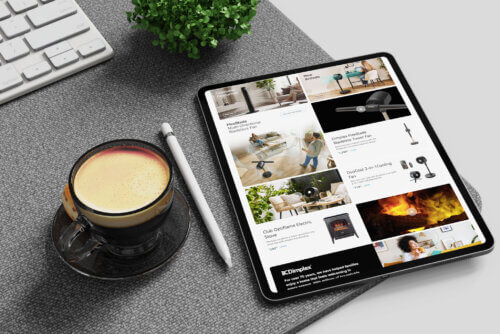 Glen Dimplex Amazon Seasonal Growth 2 - Venture Forge Tablet on a desk showing an online catalog of home appliances and fans, with a keyboard, plant, and coffee mug nearby.